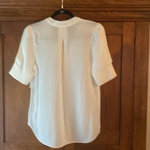 JOIE Ance Top
100 % Silk
Color Porcelain 
Size Small 
Never Worn - Picture 3 of 3